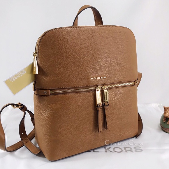Michael Kors Handbags - NWT Michael Kors Slim Backpack